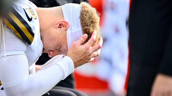 New Orleans Saints QB Spencer Rattler (2) with his head in his hands during a blowout loss to the Seattle Seahawks on Sep. 21, 2025.