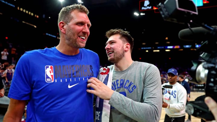 May 15, 2022; Phoenix, Arizona, USA; Dallas Mavericks guard Luka Doncic (77) greets former player
