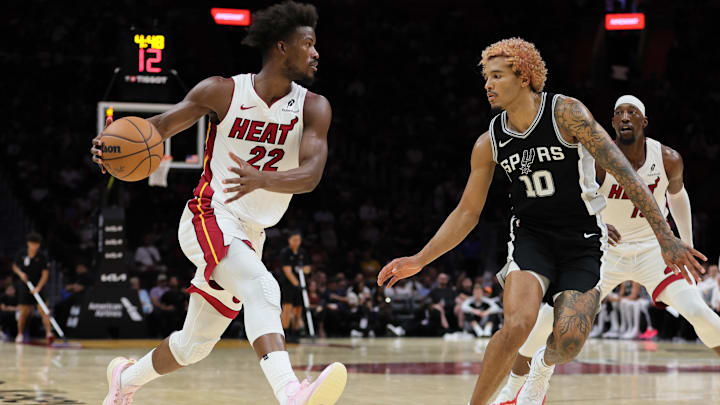 Oct 15, 2024; Miami, Florida, USA; Miami Heat forward Jimmy Butler (22) drives to the basket against San Antonio Spurs forward Jeremy Sochan (10) during the third quarter at Kaseya Center. Mandatory Credit: Sam Navarro-Imagn Images Oct 15, 2024; Miami, Florida, USA; Miami Heat forward Jimmy Butler (22) drives to the basket against San Antonio Spurs forward Jeremy Sochan (10) during the third quarter at Kaseya Center. Mandatory Credit: Sam Navarro-Imagn Images