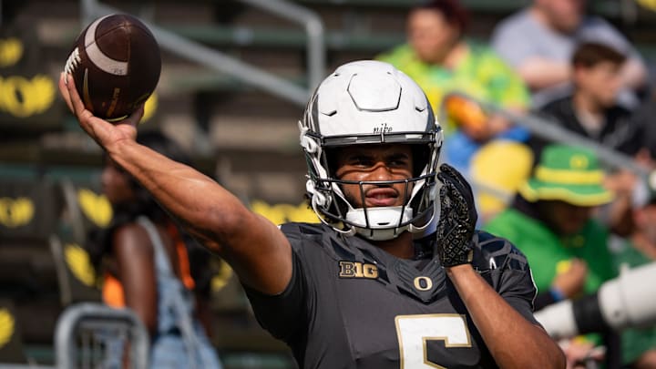 Oregon Ducks quarterback Dante Moore throws a pass during warmups as the Oregon Ducks host the Oregon State Beavers Sept. 20, 2025, at Autzen Stadium in Eugene, Oregon.