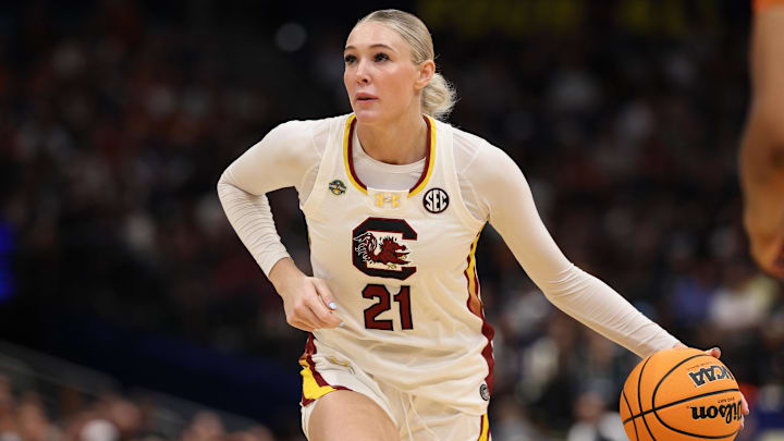 Apr 4, 2025; Tampa, FL, USA;  South Carolina Gamecocks forward Chloe Kitts (21) controls the ball against the Texas Longhorns during the third quarter in a semifinal of the women's 2025 NCAA tournament at Amalie Arena. Mandatory Credit: Nathan Ray Seebeck-Imagn Images