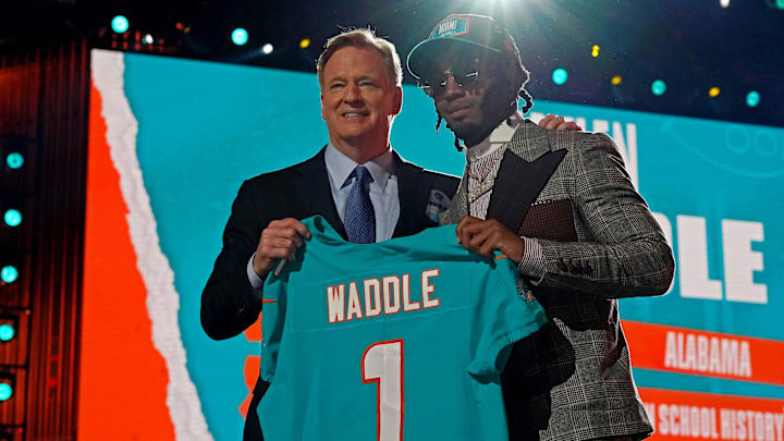 Apr 29, 2021; Cleveland, Ohio, USA; Jaylen Waddle (Alabama) with NFL commissioner Roger Goodell
