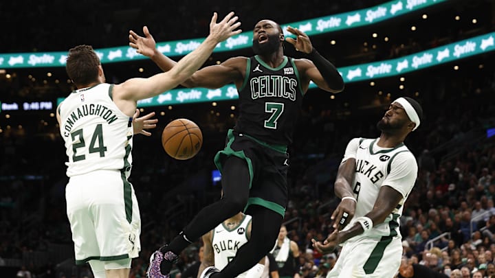 Mar 20, 2024; Boston, Massachusetts, USA; Boston Celtics guard Jaylen Brown (7) loses the ball between Milwaukee Bucks guard Pat Connaughton (24) and forward Bobby Portis (9) during the second half at TD Garden. Mandatory Credit: Winslow Townson-Imagn Images Mar 20, 2024; Boston, Massachusetts, USA; Boston Celtics guard Jaylen Brown (7) loses the ball between Milwaukee Bucks guard Pat Connaughton (24) and forward Bobby Portis (9) during the second half at TD Garden. Mandatory Credit: Winslow Townson-Imagn Images