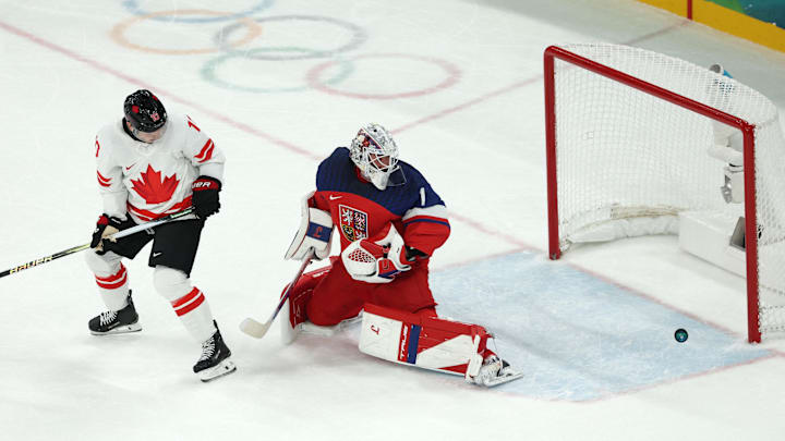 [US, Mexico & Canada customers only] Feb 12, 2026; Milan, Italy; Nick Suzuki of Canada in action with Lukas Dostal of Czech Republic in a men's ice hockey Group A match during the Milano Cortina 2026 Olympic Winter Games at Milano Santagiulia Ice Hockey Arena. Mandatory Credit: Mike Segar/Reuters via Imagn Images