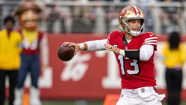 Oct 27, 2024; Santa Clara, California, USA; San Francisco 49ers quarterback Brock Purdy (13) prepares to pass against the Dallas Cowboys during the first quarter at Levi's Stadium. Mandatory Credit: Neville E. Guard-Imagn Images