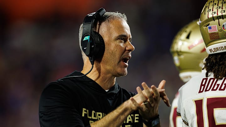 Nov 29, 2025; Gainesville, Florida, USA; Florida State Seminoles head coach Mike Norvell gestures against the Florida Gators during the second half at Ben Hill Griffin Stadium. Mandatory Credit: Matt Pendleton-Imagn Images