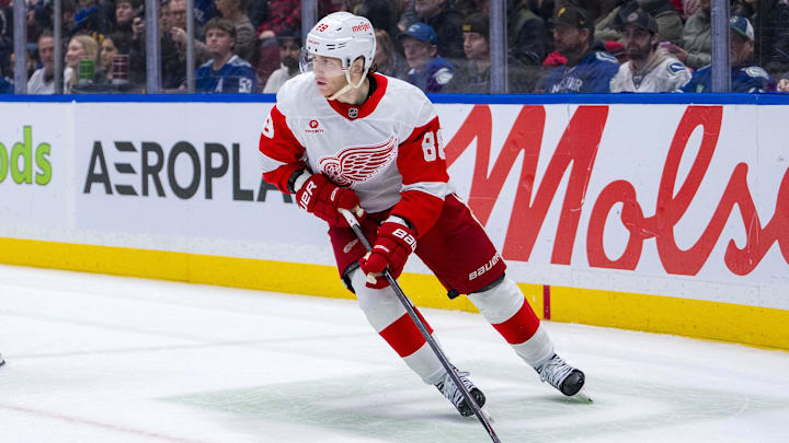 Feb 2, 2025; Vancouver, British Columbia, CAN; Detroit Red Wings forward Patrick Kane (88) handles the puck against the Vancouver Canucks in overtime at Rogers Arena. Mandatory Credit: Bob Frid-Imagn Images