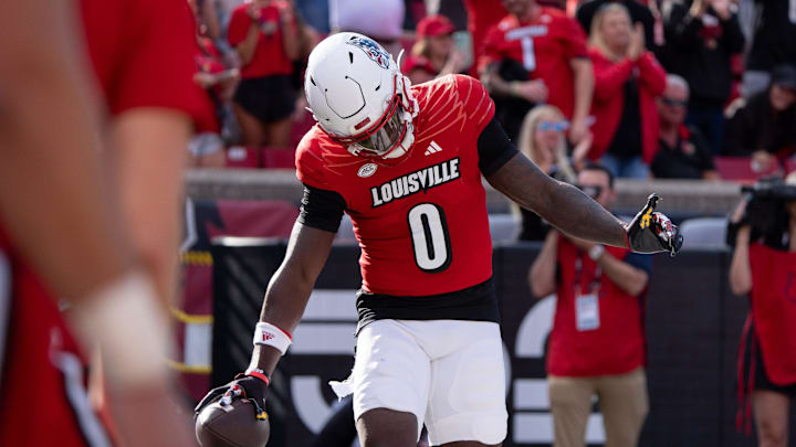 Louisville Cardinals wide receiver Chris Bell (0) celebrates his touchdown during their game against the Jacksonville State Gamecocks on Saturday, Sept. 7, 2024 at L&N Federal Credit Union Stadium in Louisville, Ky.