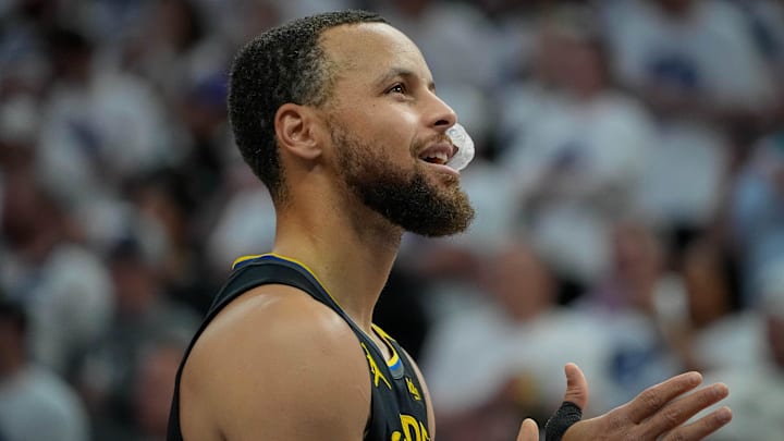 Golden State Warriors guard Stephen Curry (30) prepares to play the Minnesota Timberwolves before game one of the second round for the 2025 NBA Playoffs at Target Center.