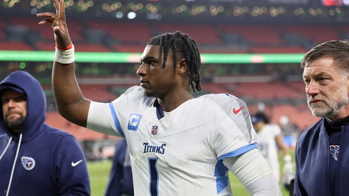 Dec 7, 2025; Cleveland, Ohio, USA; Tennessee Titans quarterback Cam Ward (1) acknowledges the crowd after the game against the Cleveland Browns at Huntington Bank Field. Mandatory Credit: Scott Galvin-Imagn Images