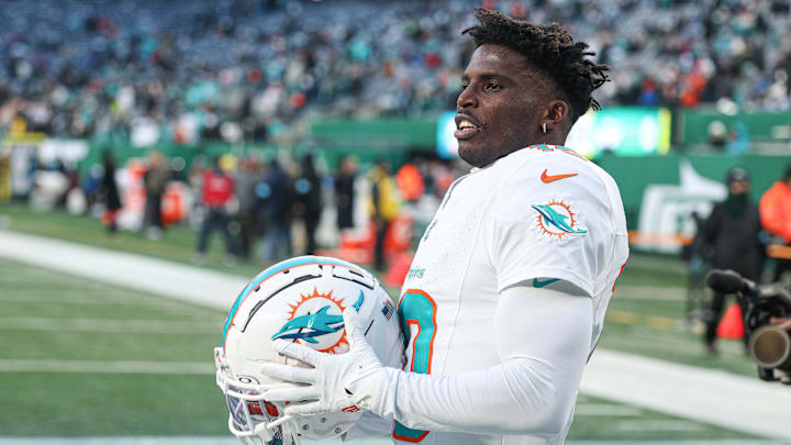 Jan 5, 2025; East Rutherford, New Jersey, USA; Miami Dolphins wide receiver Tyreek Hill (10) on the field before the game against the New York Jets at MetLife Stadium. Mandatory Credit: Vincent Carchietta-Imagn Images