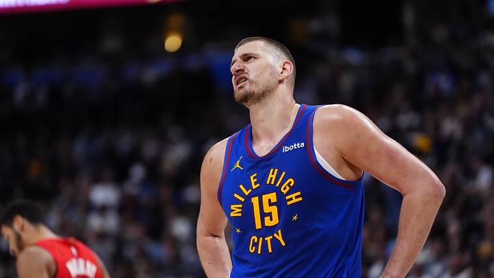 Mar 22, 2026; Denver, Colorado, USA; Denver Nuggets center Nikola Jokic (15) reacts in the second half against the Portland Trail Blazers at Ball Arena. Mandatory Credit: Ron Chenoy-Imagn Images