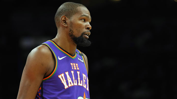 Jan 11, 2025; Phoenix, Arizona, USA; Phoenix Suns forward Kevin Durant (35) looks on against the Utah Jazz during the first half at Footprint Center. Mandatory Credit: Joe Camporeale-Imagn Images