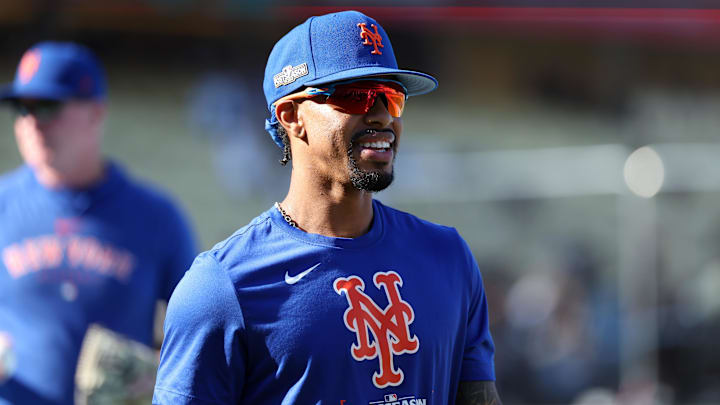 Oct 20, 2024; Los Angeles, California, USA; New York Mets shortstop Francisco Lindor (12) looks on during warm ups before game six against the Los Angeles Dodgers in the NLCS for the 2024 MLB playoffs at Dodger Stadium. Mandatory Credit: Kiyoshi Mio-Imagn Images
