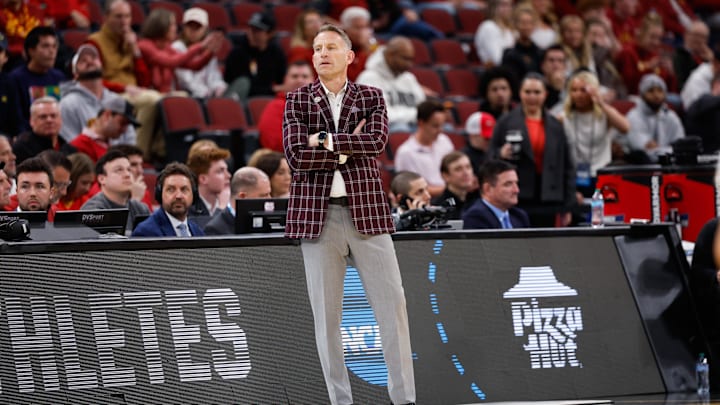 Mar 27, 2026; Chicago, IL, USA; Alabama Crimson Tide head coach Nate Oats looks on in the first half against the Michigan Wolverines during a Sweet Sixteen game of the Midwest Regional of the men's 2026 NCAA Tournament at United Center. Mandatory Credit: Kamil Krzaczynski-Imagn Images