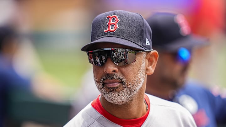 Jun 1, 2025; Cumberland, Georgia, USA; Boston Red Sox manager Alex Cora (13) shown in the dugout before the game against the Atlanta Braves at Truist Park. Mandatory Credit: Dale Zanine-Imagn Images