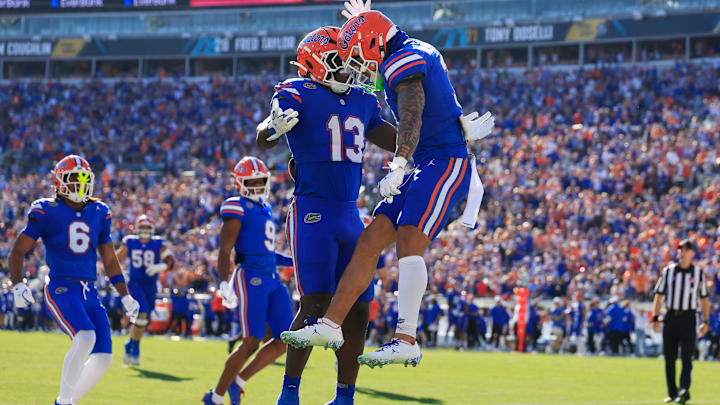 Florida Gators wide receiver Eugene Wilson III (3) celebrate his touchdown with running back Jadan Baugh (13) during the first quarter of an NCAA football game, Saturday, Nov. 1, 2025, at EverBank Stadium in Jacksonville, Fla. [Corey Perrine/Florida Times-Union]