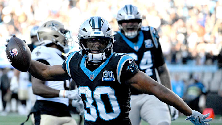 Nov 3, 2024; Charlotte, North Carolina, USA; Carolina Panthers running back Chuba Hubbard (30) celebrates after scoring the winning touchdown in the fourth qarter at Bank of America Stadium. Nov 3, 2024; Charlotte, North Carolina, USA; Carolina Panthers running back Chuba Hubbard (30) celebrates after scoring the winning touchdown in the fourth qarter at Bank of America Stadium.