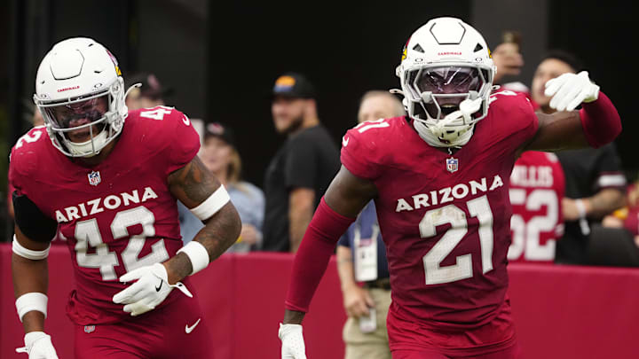 Cardinals cornerback Garrett Williams (21) celebrates an interception against the Commanders during a game at State Farm Stadium in Glendale on Sept. 29, 2024.