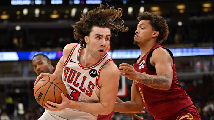 Oct 9, 2025; Chicago, Illinois, USA; Chicago Bulls guard Josh Giddey (3) controls the ball against Cleveland Cavaliers guard Craig Porter Jr. (9) during the second half at United Center. Mandatory Credit: Patrick Gorski-Imagn Images