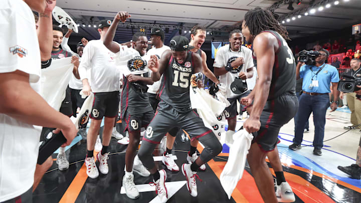 Nov 29, 2024; Paradise Island, Bahamas, BHS;  Oklahoma Sooners guard Duke Miles (15) dances with teammates after the game against the Louisville Cardinals at Imperial Arena at the Atlantis resort.  Mandatory Credit: Kevin Jairaj-Imagn Images