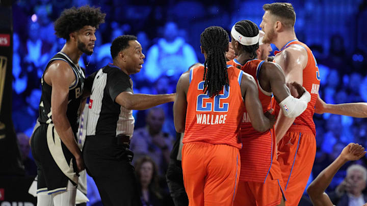 Dec 17, 2024; Las Vegas, Nevada, USA; Milwaukee Bucks guard Andre Jackson Jr. (44) and Oklahoma City Thunder center Isaiah Hartenstein (55) argue during the 2nd quarter of the Emirates NBA Cup championship game at T-Mobile Arena. Mandatory Credit: Kyle Terada-Imagn Images