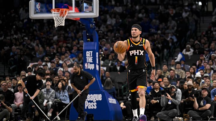 Mar 9, 2025; Dallas, Texas, USA; Phoenix Suns guard Devin Booker (1) in action during the game between the Dallas Mavericks and the Phoenix Suns at American Airlines Center. Mandatory Credit: Jerome Miron-Imagn Images