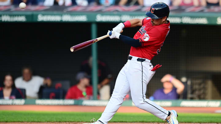 Jun 19, 2024; Cleveland, Ohio, USA; Cleveland Guardians left fielder Steven Kwan (38) hits a home run during the second inning against the Seattle Mariners at Progressive Field. Mandatory Credit: Ken Blaze-USA TODAY Sports