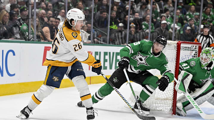 Jan 6, 2024; Dallas, Texas, USA; Nashville Predators center Philip Tomasino (26) passes the puck in