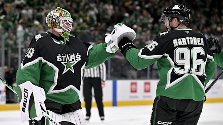 Dec 7, 2025; Dallas, Texas, USA; Dallas Stars goaltender Jake Oettinger (29) and right wing Mikko Rantanen (96) celebrate after the Stars defeat the Pittsburgh Penguins at American Airlines Center. Mandatory Credit: Jerome Miron-Imagn Images