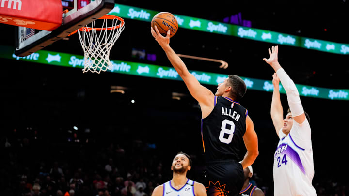 Oct 31, 2025; Phoenix, Arizona, USA; Phoenix Suns guard Grayson Allen (8) goes for a layup in the second half between the Phoenix Suns and the Utah Jazz at Mortgage Matchup Center. Mandatory Credit: Arianna Grainey-Imagn Images