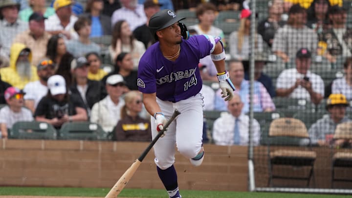 Mar 12, 2025; Salt River Pima-Maricopa, Arizona, USA; Colorado Rockies shortstop Ezequiel Tovar (14) hits against the San Diego Padres in the third inning at Salt River Fields at Talking Stick. Mandatory Credit: Rick Scuteri-Imagn Images
