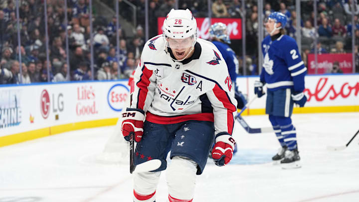 Washington Capitals center Nic Dowd celebrates after scoring a goal against the Toronto Maple Leafs.