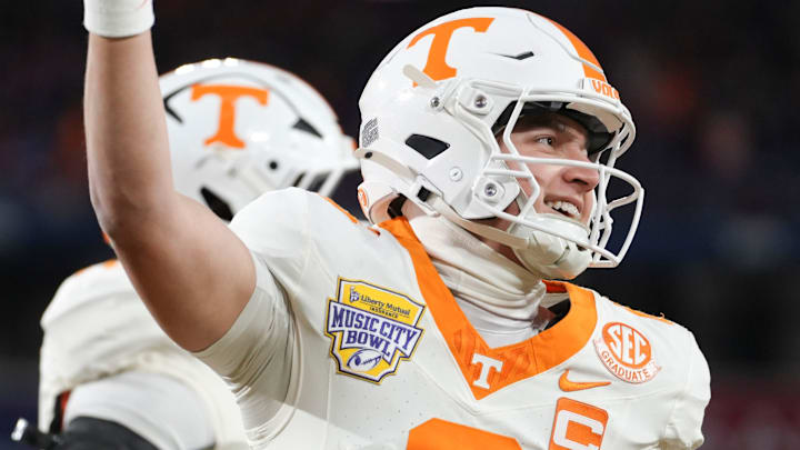 Tennessee quarterback Joey Aguilar (6) celebrates after scoring a touchdown in the Music City Bowl against Illinois in an NCAA college football game on Dec. 30, 2025, in Nashville, Tennessee.