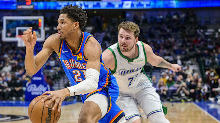 Feb 2, 2022; Dallas, Texas, USA; Oklahoma City Thunder guard Aaron Wiggins (21) drives to the basket past Dallas Mavericks guard Luka Doncic (77) during the second half at the American Airlines Center. Mandatory Credit: Jerome Miron-Imagn Images Feb 2, 2022; Dallas, Texas, USA; Oklahoma City Thunder guard Aaron Wiggins (21) drives to the basket past Dallas Mavericks guard Luka Doncic (77) during the second half at the American Airlines Center. Mandatory Credit: Jerome Miron-Imagn Images
