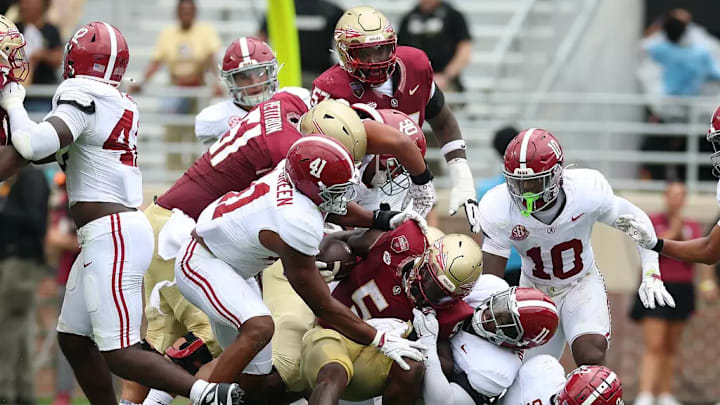 The Alabama defense makes a tackle against Florida State University at Doak Campbell Stadium in Tallahassee, FL on Saturday, Aug 30, 2025.
