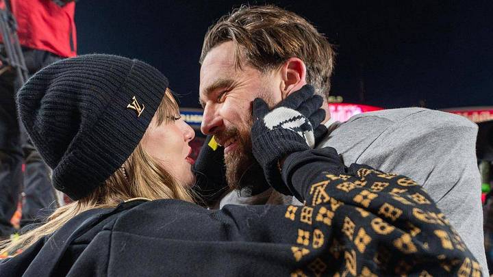 Taylor Swift embraces Kansas City Chiefs tight end Travis Kelce (87) after the Lamar Hunt trophy ceremony following the AFC Championship Game. Taylor Swift embraces Kansas City Chiefs tight end Travis Kelce (87) after the Lamar Hunt trophy ceremony following the AFC Championship Game.