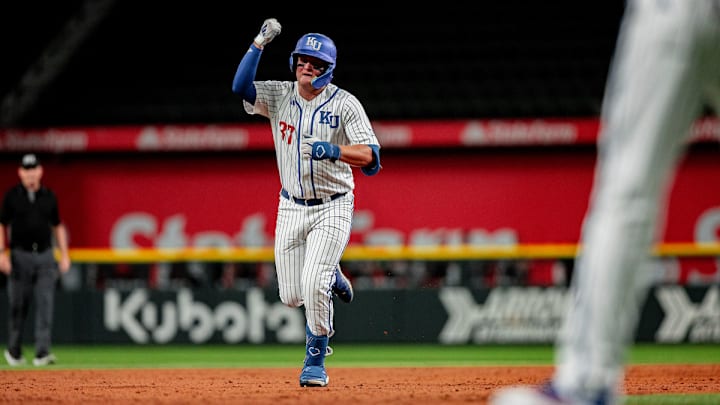 Kansas INF Brady Ballinger rounding the bases after hitting a game-tying three-run homerun in the 7th inning against Oklahoma State Kansas INF Brady Ballinger rounding the bases after hitting a game-tying three-run homerun in the 7th inning against Oklahoma State