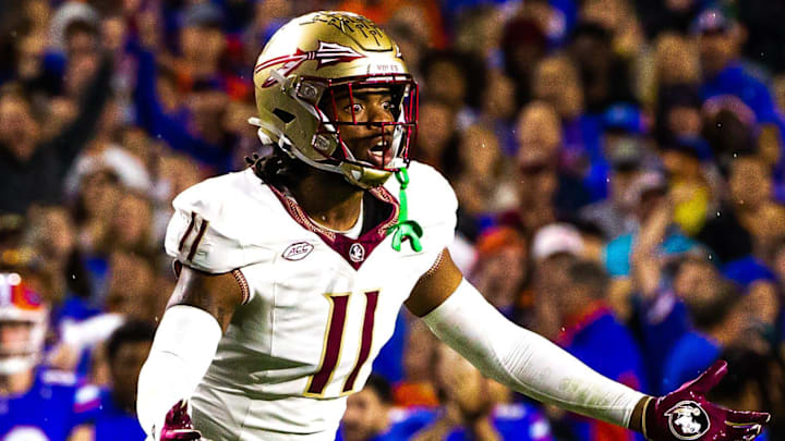 Florida State Seminoles defensive lineman Patrick Payton (11) reacts to a flag at Steve Spurrier Field at Ben Hill Griffin Stadium in Gainesville, FL on Saturday, November 25, 2023 during the first half. [Doug Engle/Gainesville Sun]