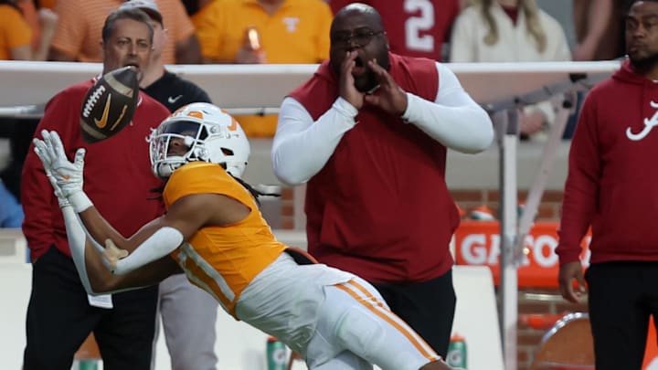 Oct 19, 2024; Knoxville, Tennessee, USA; Tennessee Volunteers wide receiver Chris Brazzell II (17) dives for first down catch against the Alabama Crimson Tide in the fourth quarter at Neyland Stadium. Mandatory Credit: Alan Poizner-Imagn Images