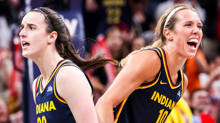 Indiana Fever guard Caitlin Clark (22) and Indiana Fever guard Lexie Hull (10) celebrate Saturday, June 14, 2025, during a game between the Indiana Fever and the New York Liberty at Gainbridge Fieldhouse in Indianapolis. The Indiana Fever defeated the New York Liberty, 102-88.