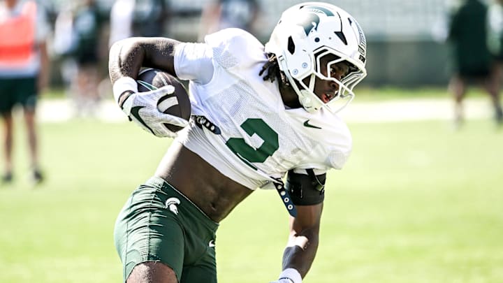 Michigan State's Aydan West runs with the ball during football practice on Monday, Aug. 11, 2025, in East Lansing.