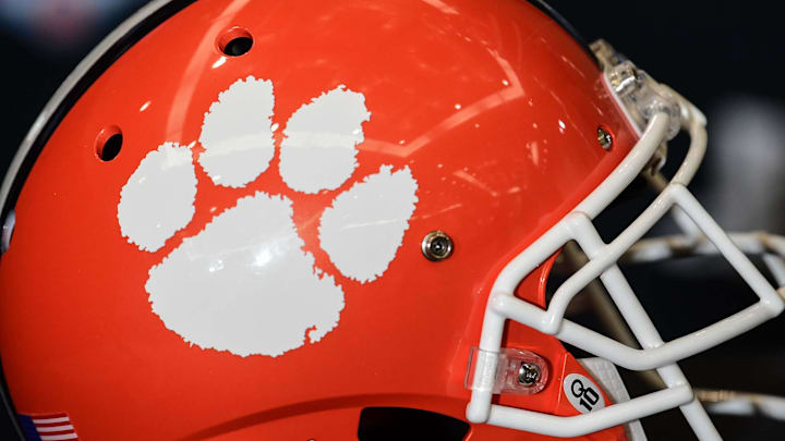 The Clemson football helmet near the Fiesta Bowl trophy at the coaches press conference in Scottsdale, Arizona Friday December 27, 2019.

Clemson Fans Fiesta Bowl Coaches Conference
