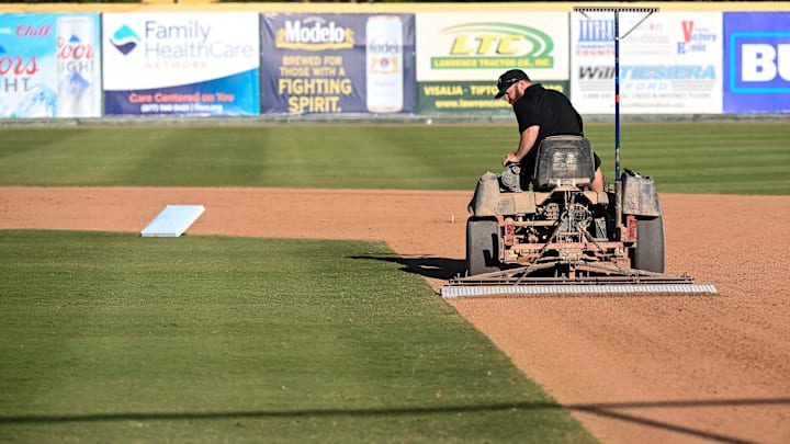 James Templeton prepares the infield