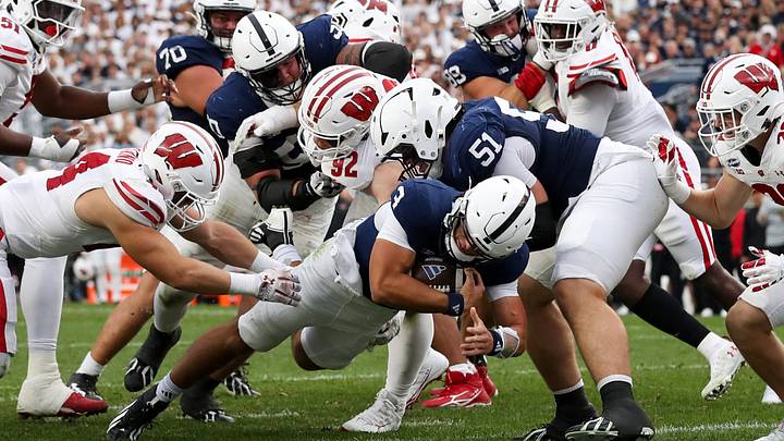 Penn State Nittany Lions quarterback Rocco Becht (3) scores a touchdown against the Wisconsin Badgers at Beaver Stadium. Penn State Nittany Lions quarterback Rocco Becht (3) scores a touchdown against the Wisconsin Badgers at Beaver Stadium.