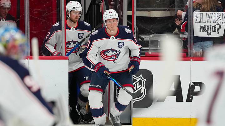 Apr 2, 2026; Raleigh, North Carolina, USA;  Columbus Blue Jackets center Isac Lundestrom (21) skates out onto the ice for the warmups before the game against the Carolina Hurricanes at Lenovo Center. Mandatory Credit: James Guillory-Imagn Images