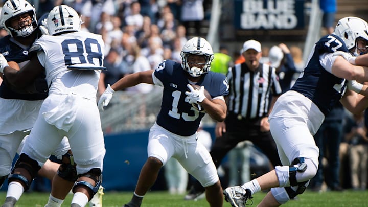 Penn State running back Kaytron Allen (13) carries the ball during the Blue-White Game at Beaver Stadium. Penn State running back Kaytron Allen (13) carries the ball during the Blue-White Game at Beaver Stadium.