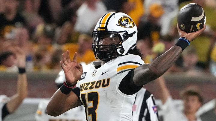Sep 3, 2026; Columbia, Missouri, USA; Missouri Tigers quarterback Austin Simmons (13) throws a pass against the Arkansas-Pine Bluff Golden Lions during the first half at Faurot Field at Memorial Stadium. Mandatory Credit: Denny Medley-Imagn Images Sep 3, 2026; Columbia, Missouri, USA; Missouri Tigers quarterback Austin Simmons (13) throws a pass against the Arkansas-Pine Bluff Golden Lions during the first half at Faurot Field at Memorial Stadium. Mandatory Credit: Denny Medley-Imagn Images