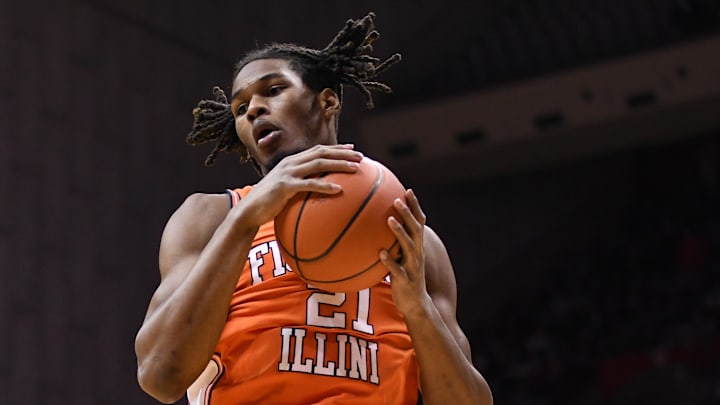 Jan 14, 2025; Bloomington, Indiana, USA; Illinois Fighting Illini forward Morez Johnson Jr. (21) rebounds the ball during the first half against the Indiana Hoosiers at Simon Skjodt Assembly Hall. Mandatory Credit: Robert Goddin-Imagn Images