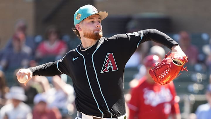 Arizona Diamondbacks pitcher Ryne Nelson (19) throws to the Cincinnati Reds in the second inning during a spring training game on March 16, 2026, at Salt River Fields in Scottsdale. Arizona Diamondbacks pitcher Ryne Nelson (19) throws to the Cincinnati Reds in the second inning during a spring training game on March 16, 2026, at Salt River Fields in Scottsdale.